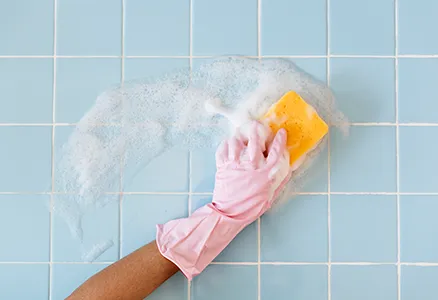 Airbnb bathroom sanitization and staging in NYC — toilet, shower and fresh towel setup